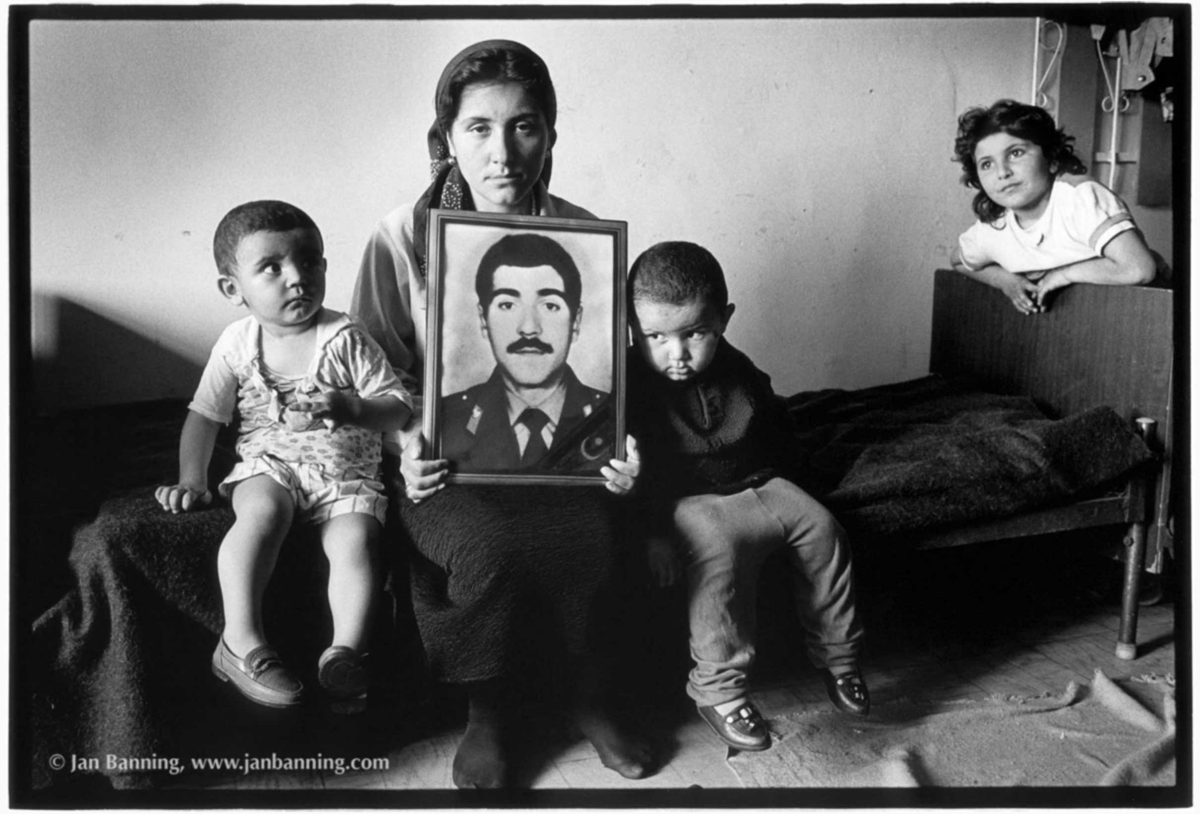 AZERBAIJAN-refugee-with-portrait-of-husband