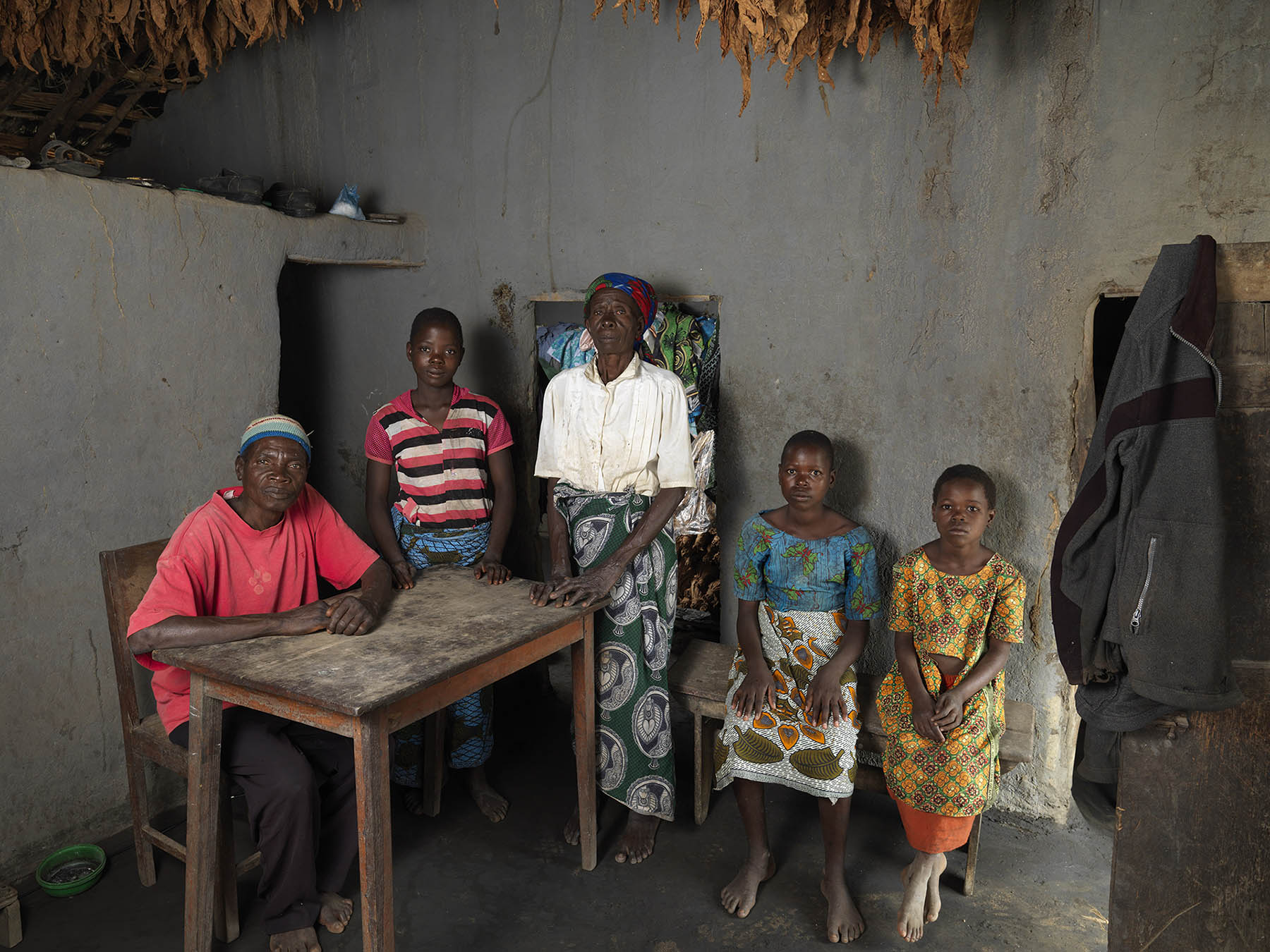 Malawi, Dickson village. Augustino Wilson (73), his wife Keterina Augustino (70) and their granddaughters (L to R) Mariguerita (14), Msakiria (10) and Efero (7).